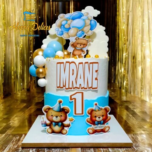 First birthday cake for boys with teddy bear and blue balloons