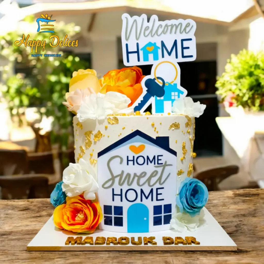 Elegant home sweet home cake with floral decorations and gold details for housewarming celebration