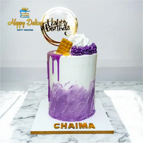 Purple drip birthday cake with cream swirls and golden topper by Happy Delices
