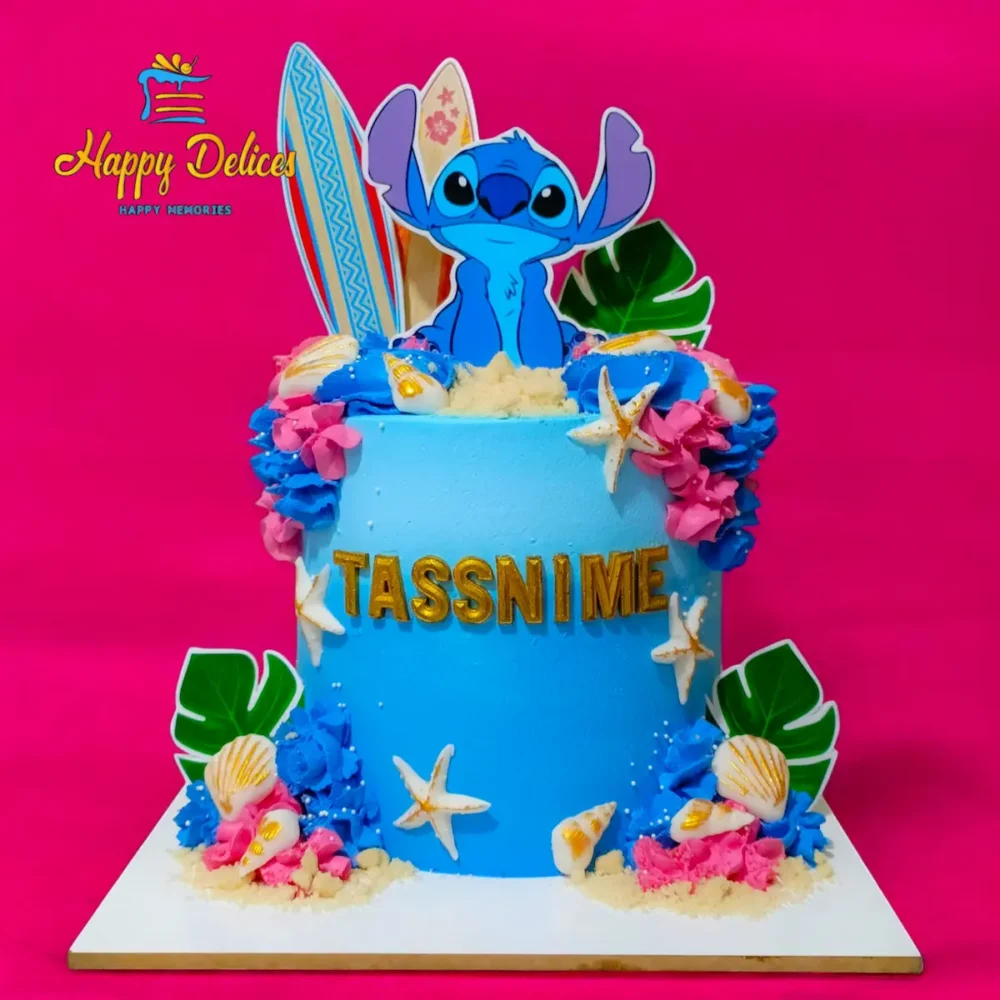 Blue Stitch birthday cake with tropical beach and seashell decorations by Happy Delices
