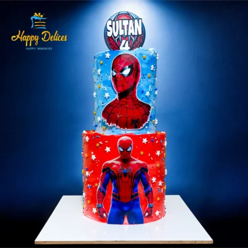 Two-tier Spiderman birthday cake with blue and red design featuring character illustrations by Happy Delices