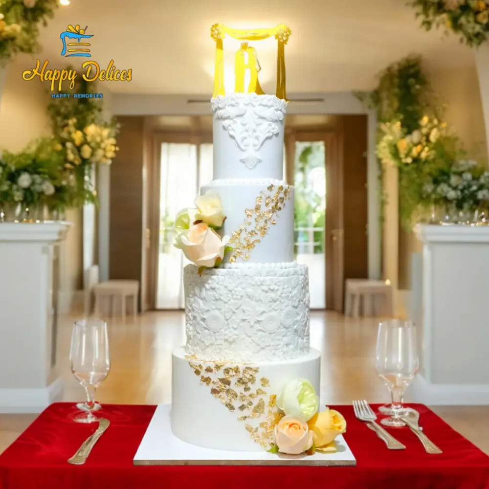 Luxury White & Gold Wedding Cake | Happy Delices Elegant white and gold wedding cake with floral details and lace texture by Happy Delices