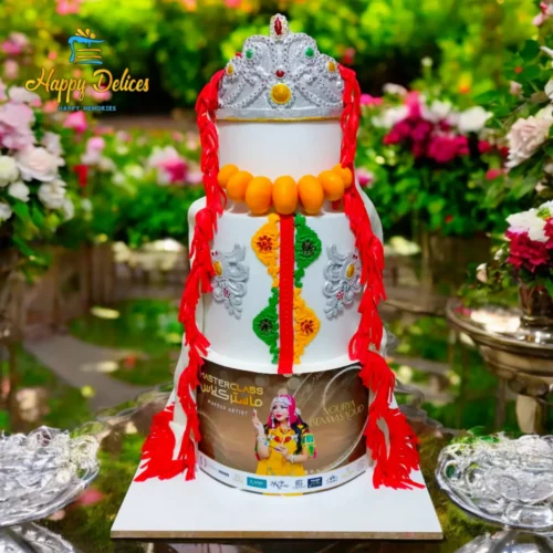 Traditional Amazigh Berber Cake | Happy Delices Traditional Amazigh Berber-inspired cake decorated with cultural accessories and vibrant Moroccan motifs