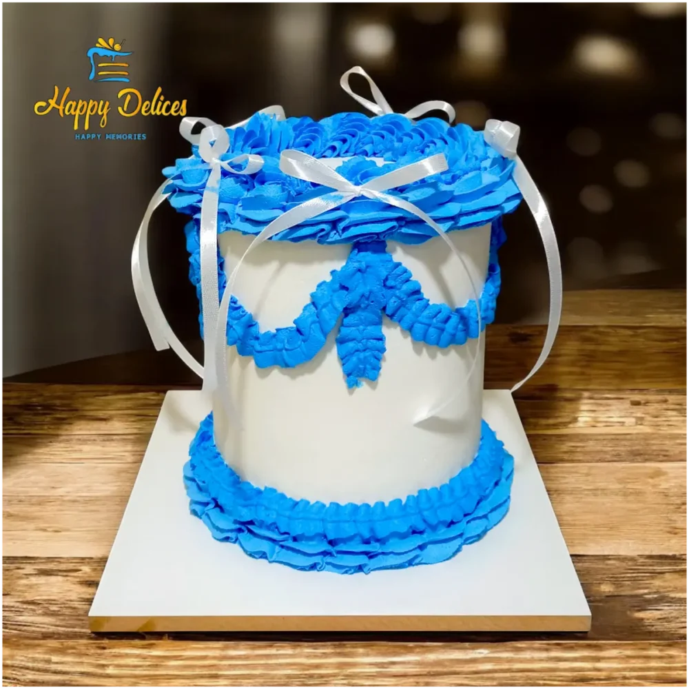 White and blue vintage cake with ribbons by Happy Delices