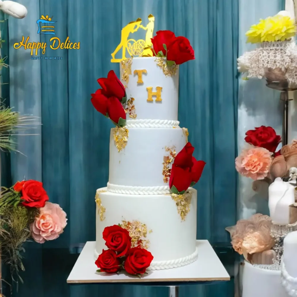 Wedding Cake With Red Roses & Gold | Happy Delices Three-tier wedding cake decorated with red roses and gold accents