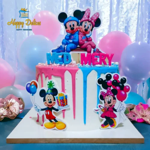 Mickey and Minnie themed birthday cake with pink and blue drip design by Happy Delices