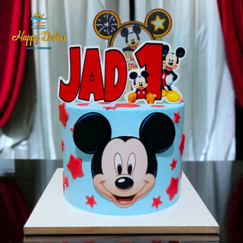 Mickey Mouse blue birthday cake with name and number one topper by Happy Delices