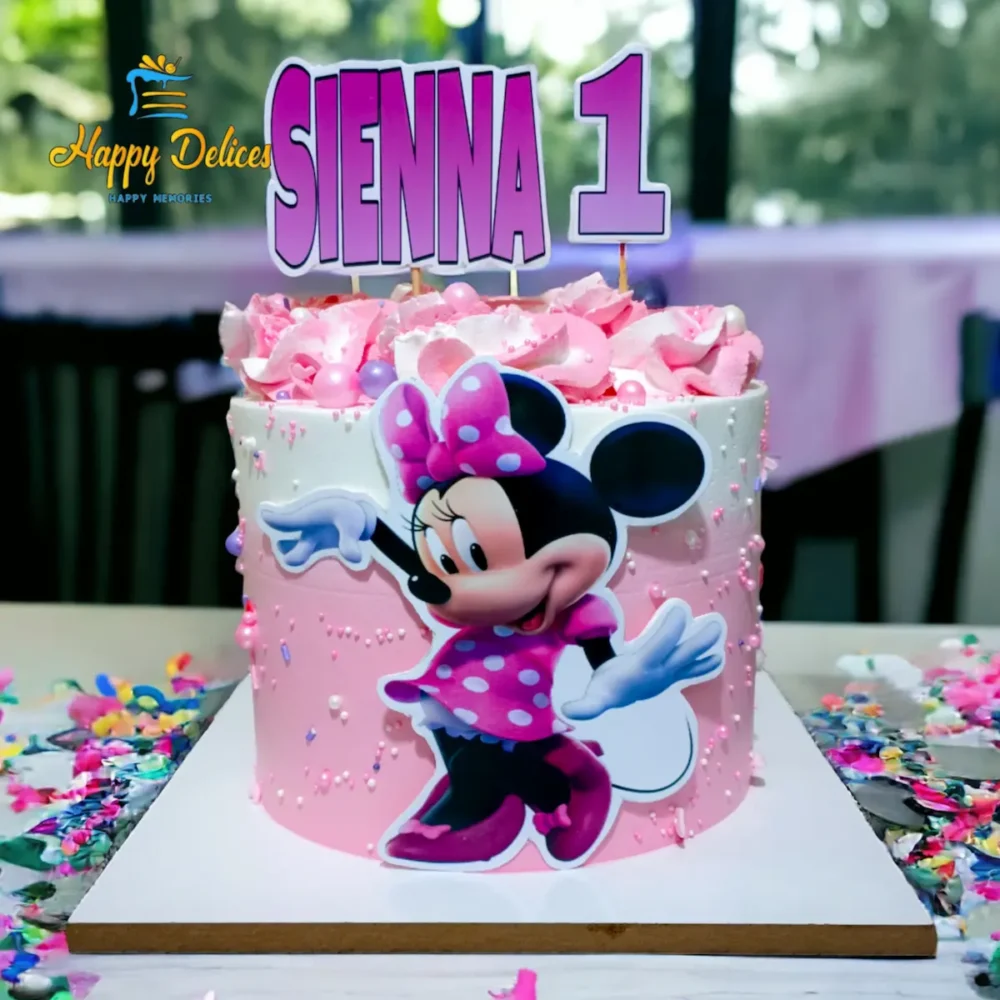 Minnie Mouse pink birthday cake with name topper and number one design by Happy Delices