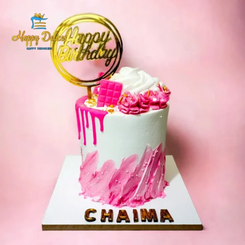 Elegant pink birthday cake with gold topper and personalized name by Happy Delices