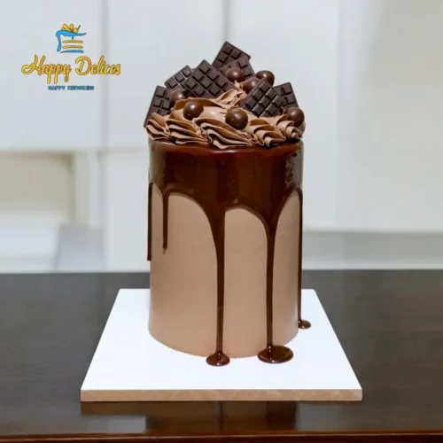 Luxury chocolate drip cake with smooth ganache and chocolate toppings by Happy Delices