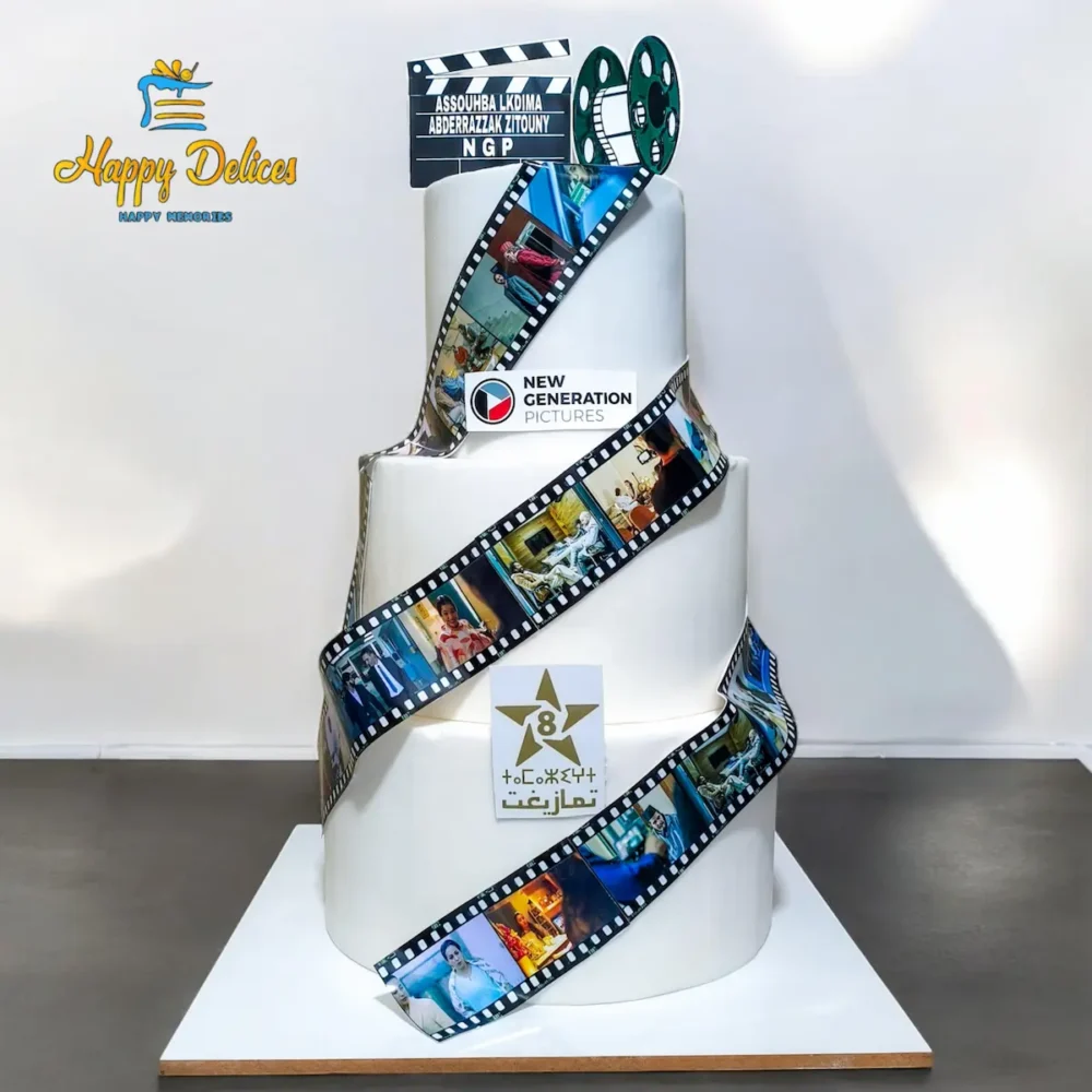 Cinema themed cake with film reel design, movie elements and custom photos by Happy Delices