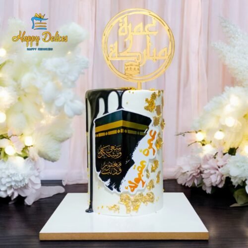 Kaaba themed birthday cake with black and white design, gold accents and Islamic decoration by Happy Delices