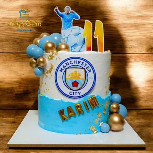 Manchester City football themed birthday cake with player topper and custom name by Happy Delices