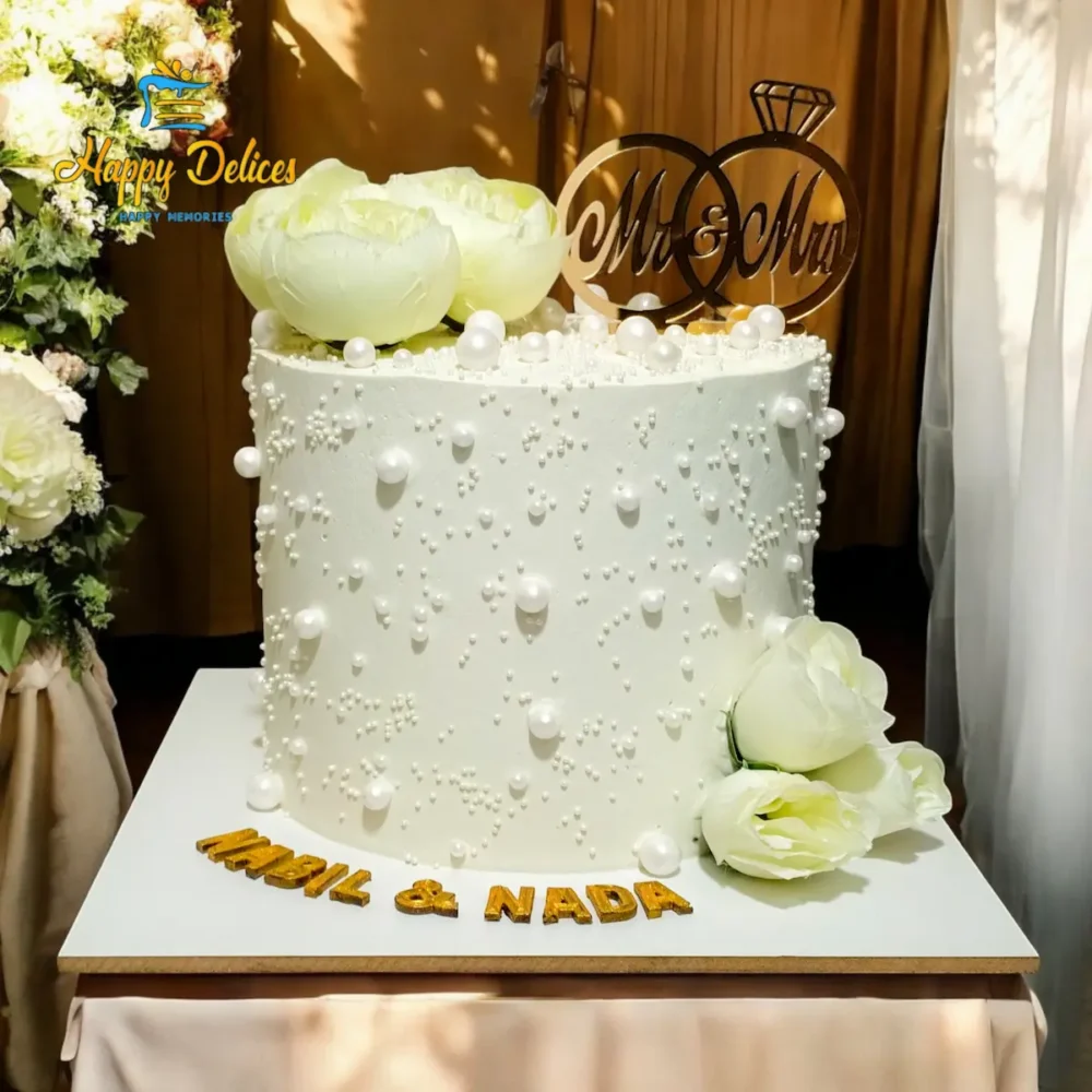 Luxury white pearl engagement cake with Mr and Mrs topper by Happy Delices