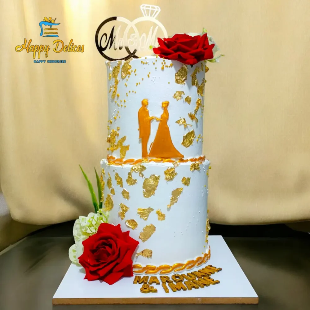 Luxury two tier engagement cake with red roses and gold details by Happy Delices