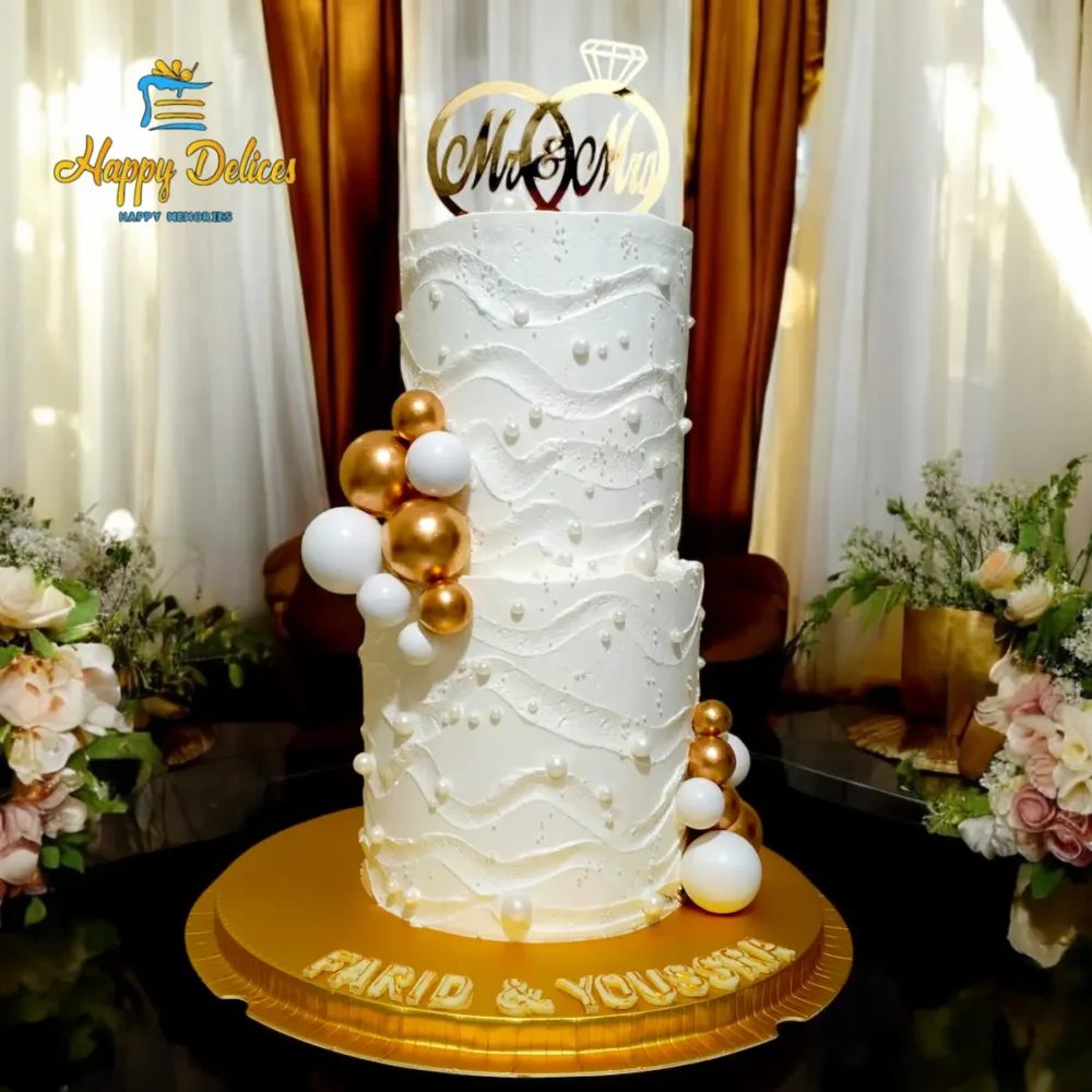 Luxury White and Gold Wave Texture Engagement Cake with Mr and Mrs Topper | Happy Delices Luxury white engagement cake with wave texture and gold balloon details by Happy Delices