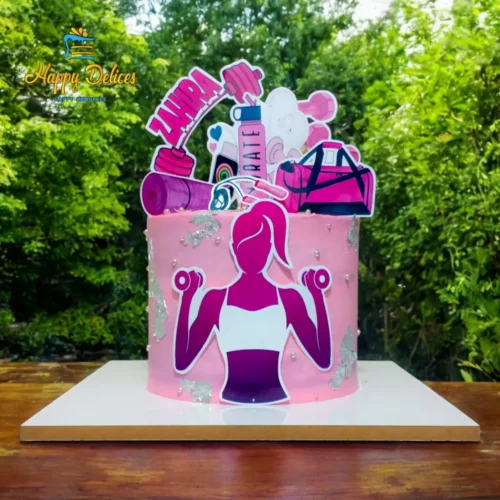 Fitness & Gym Birthday Cake for Women | Happy Delices Agadir Pink fitness themed birthday cake with gym equipment and workout decorations personalized for Zahra