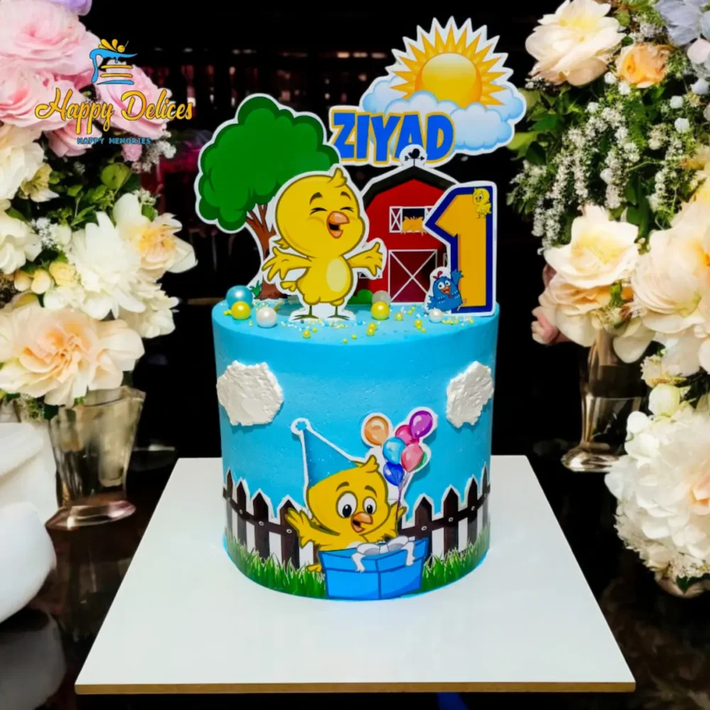 Little chick themed first birthday cake with farm decorations for Ziyad's first birthday
