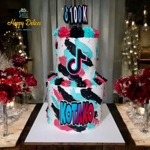 TikTok 100K Milestone Celebration Cake | Custom Social Media Cake by Happy Delices TikTok themed celebration cake with 100K topper and colorful social media design