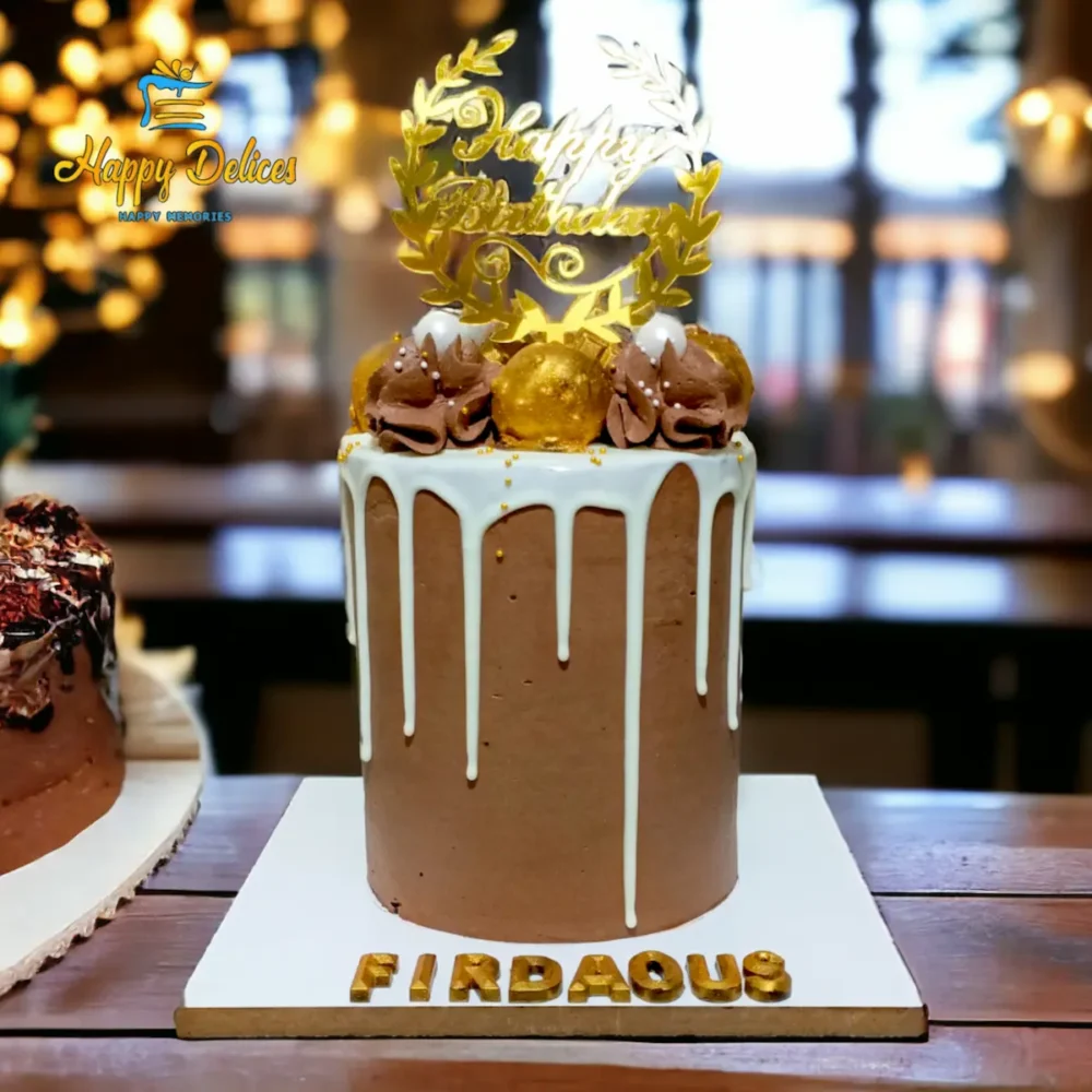 Luxury Chocolate Drip Birthday Cake | Happy Delices Elegant chocolate drip birthday cake with white ganache drip, gold decorations and Happy Birthday topper personalized for Firdaous.