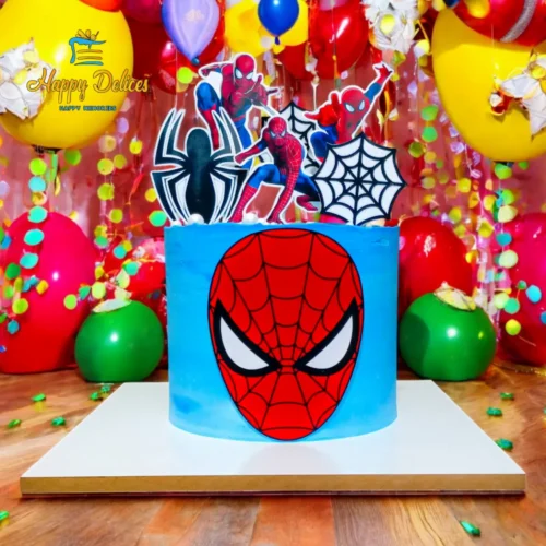 Spider-Man Birthday Cake for Kids | Happy Delices Spider-Man themed birthday cake with superhero toppers, spider web decorations and blue buttercream frosting